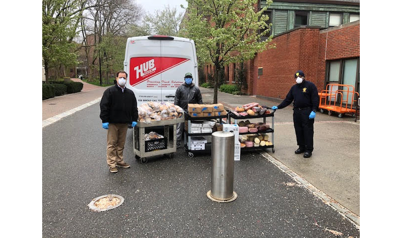 Pratt Public Safety Tour Supervisor Tyrone Spence, Rethink Food NYC Driver Elijah Inniss, and Dennis Mazone, Assistant Vice President of Campus Safety and Preparedness, facilitating the donation of food from Pratt