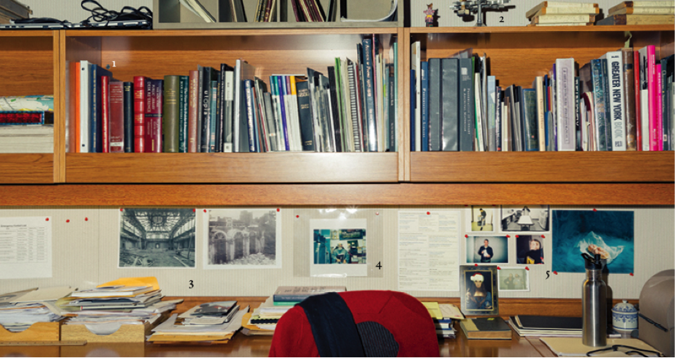 A desk, a chair, and books