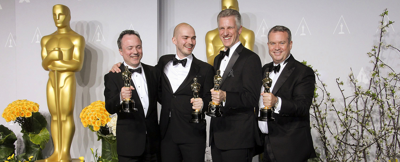 L-R Tim Webber, Chris Lawrence, David Shirk and Neil Corbould pose in the press room during the Oscars at Loews Hollywood Hotel on March 2nd, 2014 Hollywood, California, USA.